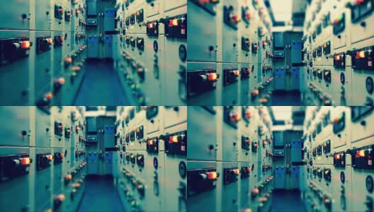 电气开关柜室的延时，工厂上的工业电气开关面板和过程控制与工业概念的复古冷色调。高清在线视频素材下载