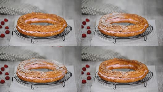 自制泡芙糕点巴黎布雷斯特与覆盆子。高清在线视频素材下载