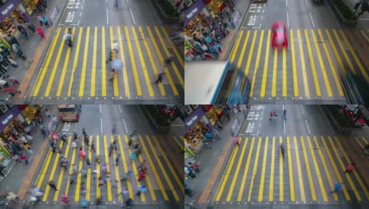 慢镜头:行人穿过香港九龙弥敦道旺角花园街市的人行横道高清在线视频素材下载