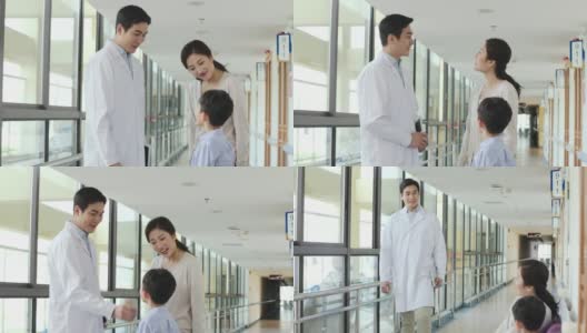 亚洲医生与母亲和儿子在医院交谈高清在线视频素材下载