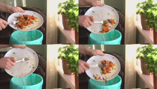 家庭主妇把烤好的蔬菜扔进垃圾桶高清在线视频素材下载