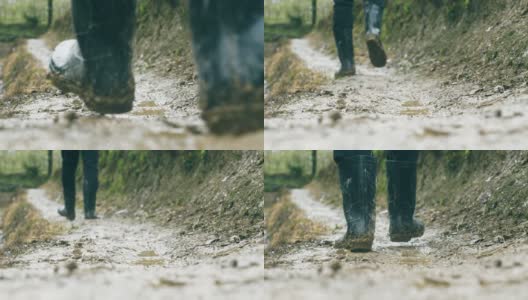 在雨天走在肮脏的路上高清在线视频素材下载