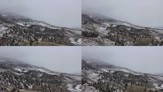 在科罗拉多州的雪山上飞行高清在线视频素材下载