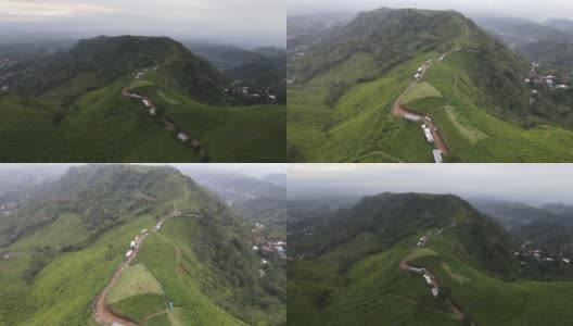以拉乌山为背景的印度尼西亚科木宁茶园鸟瞰图高清在线视频素材下载