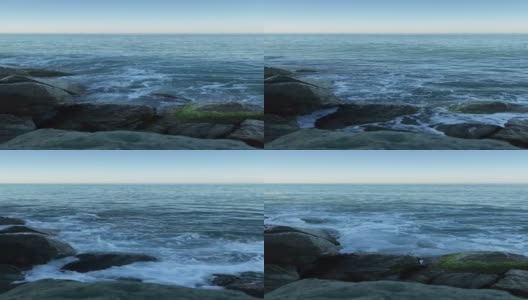 海浪拍打着岸边的石头高清在线视频素材下载