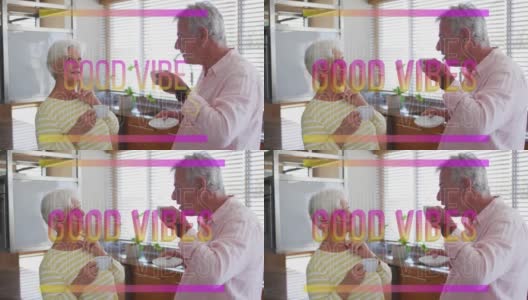 快乐的白人老年夫妇在厨房喝咖啡聊天时，粉红色的良好氛围的动画高清在线视频素材下载