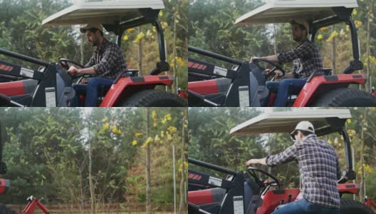 一名男子坐在一辆小型农用车的方向盘后面，开始驾驶高清在线视频素材下载