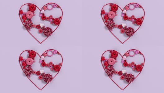 五颜六色的花，甜甜圈和糖果在粉红色的背景上创建心形在4K分辨率高清在线视频素材下载