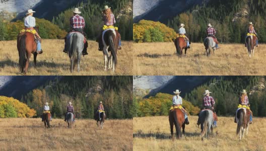 牛仔和两个女牛仔骑向山上高清在线视频素材下载