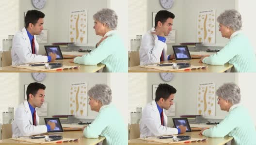 墨西哥医生向老年病人解释x光高清在线视频素材下载