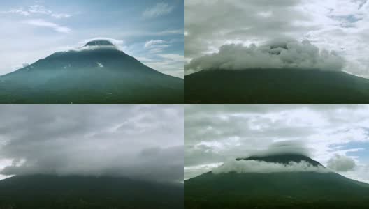 美丽的云在默拉皮山周围移动高清在线视频素材下载