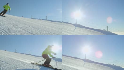 慢动作跟踪完美的雪道与滑雪者雕刻下斜坡高清在线视频素材下载
