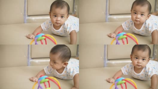 亚洲婴儿在家里玩玩具高清在线视频素材下载