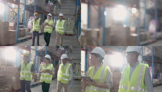 亚洲华人管理库存与仓库工人在仓库与白色安全帽高清在线视频素材下载