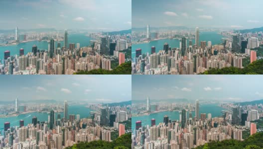 时间流逝，香港城市的天际线与蓝天和白云。从山顶俯瞰香港摩天大楼高清在线视频素材下载