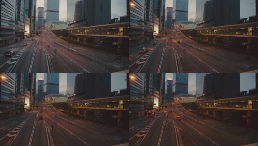 4k Dci分辨率交通道路的时间推移，中国香港市中心的现代商业大厦。天际线，城市景观，日落高清在线视频素材下载