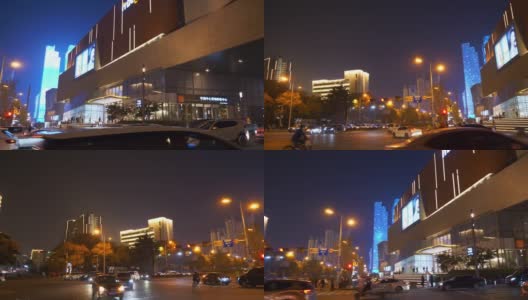夜光青岛市市中心著名商场交通街道慢镜头全景4k中国高清在线视频素材下载