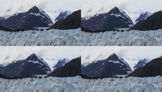 Margerie Glacier and the snowcapped mountains around it.高清在线视频素材下载