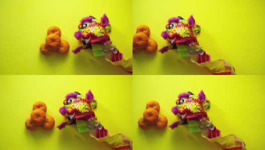 舞狮、木偶和橘子——中国新年装饰品高清在线视频素材下载