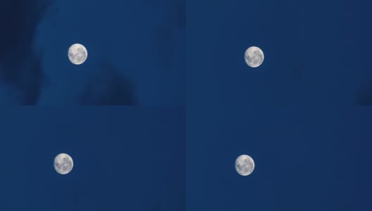 夜晚黎明前深蓝色天空中满月的垂直时间间隔高清在线视频素材下载