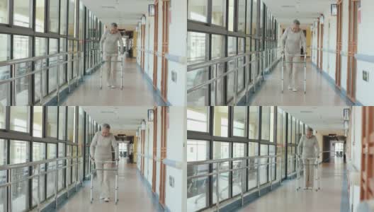 在走廊上用助行器走路的亚洲老妇人高清在线视频素材下载
