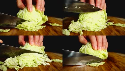 厨师用刀切白菜。缓慢的运动。高清在线视频素材下载
