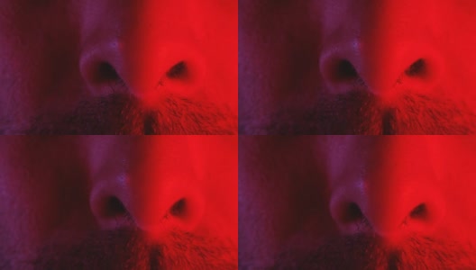 男人鼻子强烈地嗅、闻或呼吸的特写镜头高清在线视频素材下载