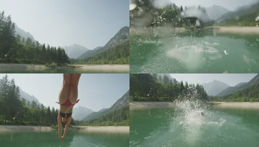 慢镜头特写:年轻的黑发女子在比基尼跳过镜头和跳水到美丽的山湖在阳光明媚的夏天高清在线视频素材下载