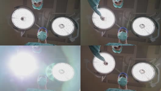 两个兽医在手术室动手术高清在线视频素材下载