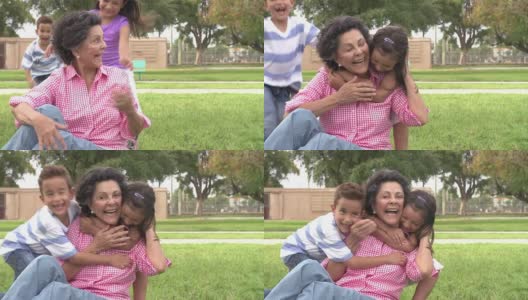 老奶奶和孙子们在公园里的慢动作镜头高清在线视频素材下载