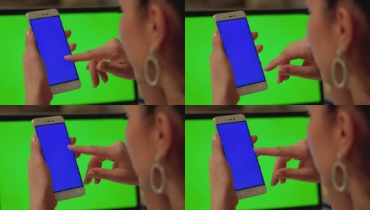 女孩触碰蓝屏手机高清在线视频素材下载