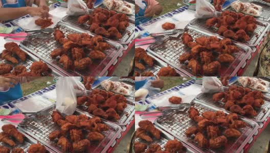 泰国街头市场的美味炸鸡高清在线视频素材下载