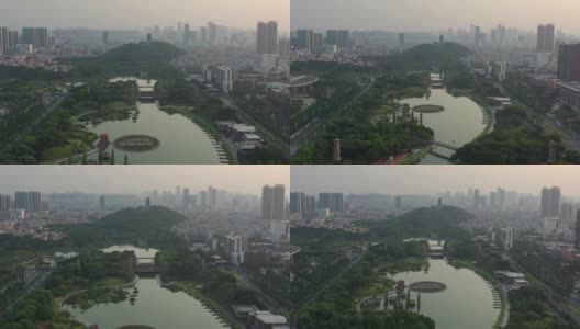 日落时分佛山市区著名的公园湖广场航拍全景4k中国高清在线视频素材下载
