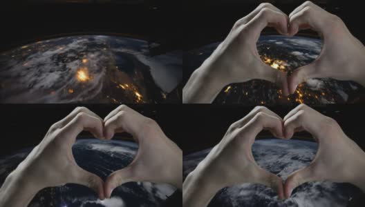 在太空中，地球行星上的手形成了一颗心。这段视频的元素由美国宇航局提供。高清在线视频素材下载