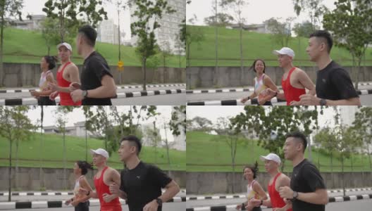 一群亚洲华人运动员在周末跑步练习高清在线视频素材下载