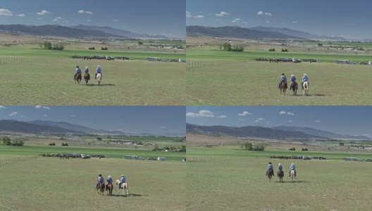 马背上的牛仔加入朋友-无人机射击高清在线视频素材下载