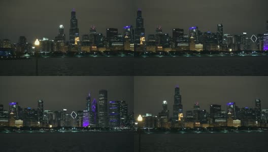 芝加哥市中心的夜晚。城市全景相机水平运动。芝加哥,伊利诺斯州,美国。高清在线视频素材下载