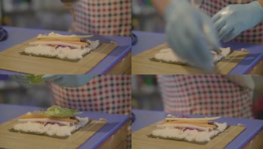 特写手准备寿司卷高清在线视频素材下载