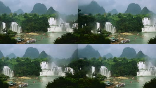 Bangioc瀑布公共关系在越南和德天瀑布鸟瞰在中国，位于边境附近，人们可以看到这两个国家的瀑布高清在线视频素材下载