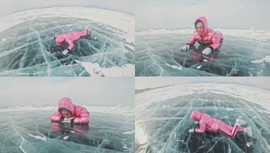 一个女孩走在贝加尔湖破裂的冰面上。一名女旅行者探索并看着一块浮冰。这是自然界中最神奇最纯净的地方。冰环绕着旅行者所有的旅程。高清在线视频素材下载