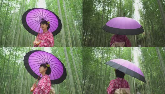 一名年轻女子在京都的竹林中行走高清在线视频素材下载
