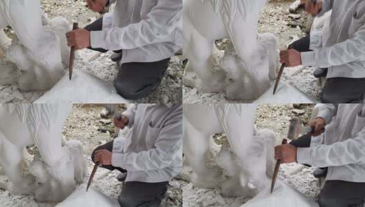 用工具雕刻的石雕师高清在线视频素材下载