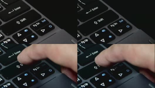 一个手指敲击笔记本键盘上的shift键高清在线视频素材下载
