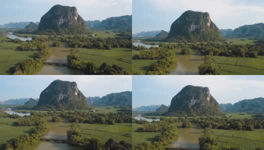 中国农村的石灰岩景观和风景优美的河流在广西的稻田周围高清在线视频素材下载