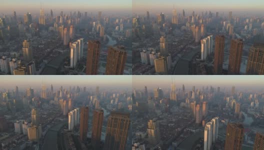 阳光明媚的早晨，上海的天际线。浦西区。中国高空鸟瞰图。无人机向后飞行。远景高清在线视频素材下载