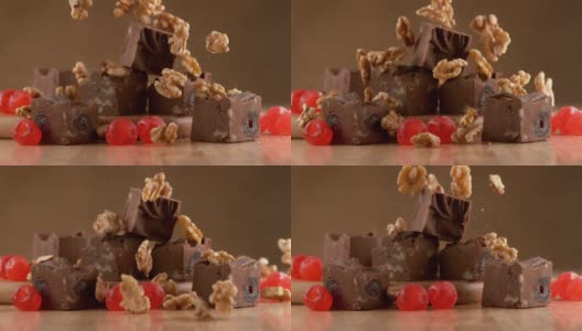 核桃樱桃软糖与配料下降在慢动作。使用幻影Flex 4K相机拍摄。高清在线视频素材下载