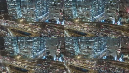 T/L PAN鸟瞰图多个高速公路在夜间高峰时间的交通/北京，中国高清在线视频素材下载