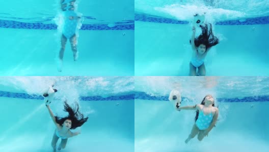 小女孩戴着动物面具在游泳池里跳高清在线视频素材下载