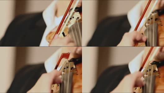 手的一个音乐家演奏在一个违禁品，古董，低音提琴手弹奏违禁品乐器高清在线视频素材下载