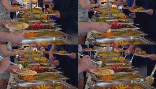 在豪华餐厅室内组团餐饮自助餐，以肉类、五颜六色的水果和蔬菜为主。高清在线视频素材下载